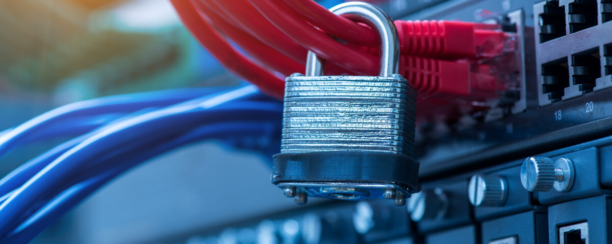 computer wires locked with a padlock